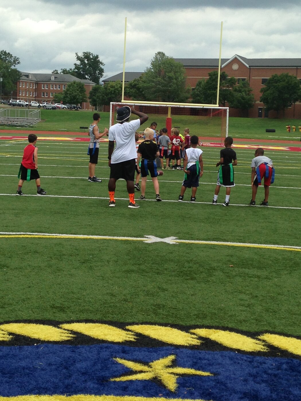 Royal Athletes coaches leading a camp at Marine Corps Base Quantico
